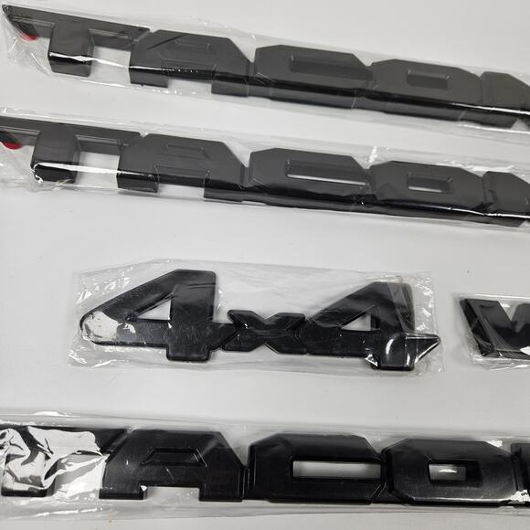 2016-2023 Toyota Tacoma Matte Black Emblem Overlay Kit, 5 pieces - Picture 2 of 3
